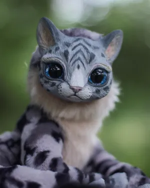 Snow leopard– Grey